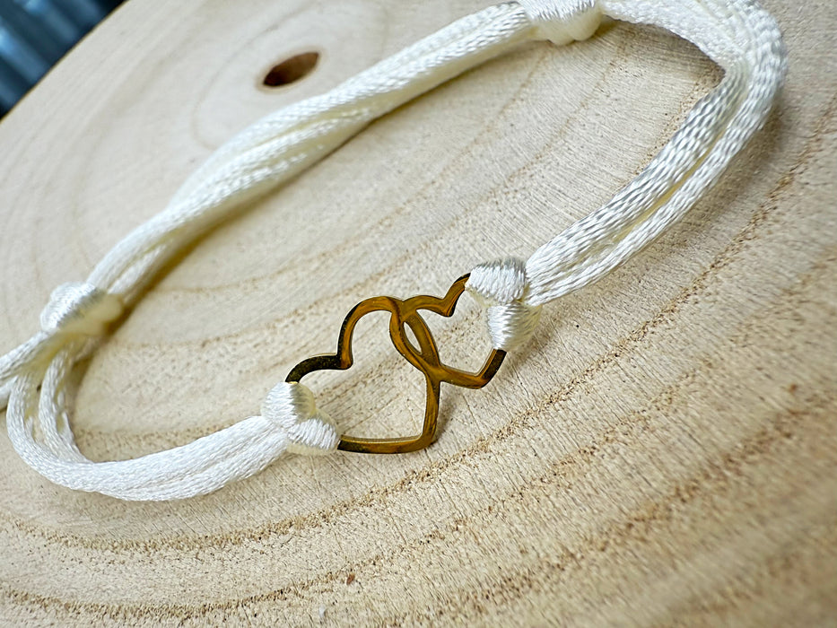 Pulsera Corazones beige